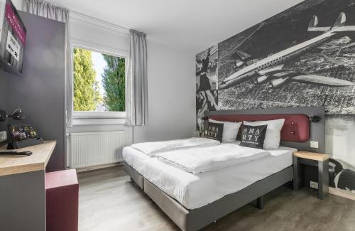 Urbach Hotel | SMARTY Airport Cologne Hotel - KONTAKTLOSER SELF CHECK-IN