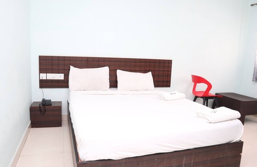 RR Nagar Hotel | Smile stay Karanji Comforts