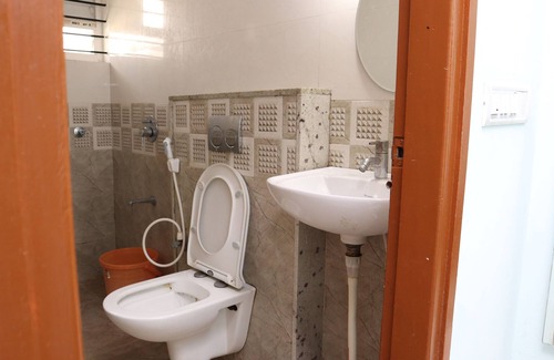 RR Nagar Hotel | Smile stay Karanji Comforts