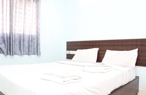 RR Nagar Hotel | Smile stay Karanji Comforts