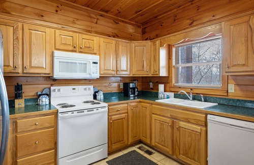 Sevierville Cabin | Smoky Mountain Lodge 6 Bedroom Cabin by RedAwning