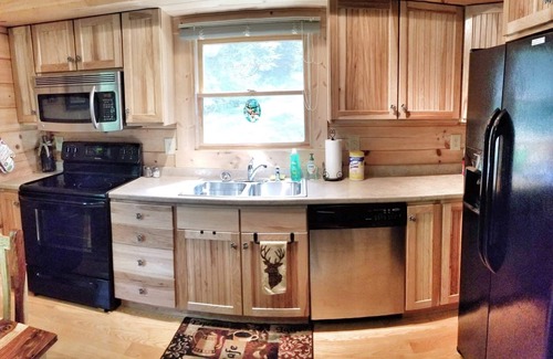 Cranberry Falls Cabin | Smoky Mtn Cabin Wrapped in woods w/Whispering Creek, Minutes from BRP