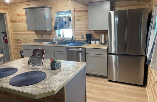 Vanderbilt Cottage | Snow his here sled from your door Cozy 3 bedroom cottage in town-pet friendly!