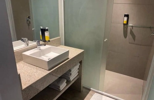 Praia da Armacao do Itapocoroi Apartment | Solar stone hotel on the island.
