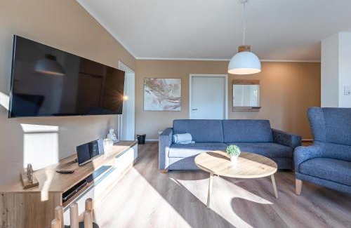 Krakow am See Apartment | Sonnengruß - Stilvolles Apartment mit Balkon, Kamin & Wellness-Flair am Krakower See