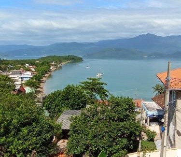 Caiacanga Apartment | Sossego, Linda vista, praia 400mts e home-office