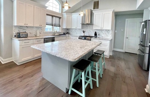 Townsend's Inlet House | Southend Townhouse Great beaches! Features nice front porch, CENTRAL AIR, off street parking.