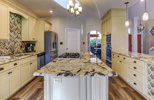 Terrell House | Southern Exposure - Charming Lake Front Home - Private Dock, Screened in Porch, Hot Tub