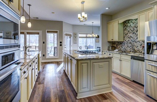 Terrell House | Southern Exposure - Charming Lake Front Home - Private Dock, Screened in Porch, Hot Tub