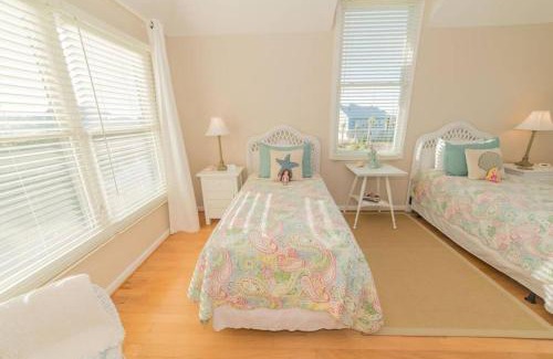 Beachwalk House | Southern Sunshine! Beach views and steps to the sand, short golf cart ride to the pool.
