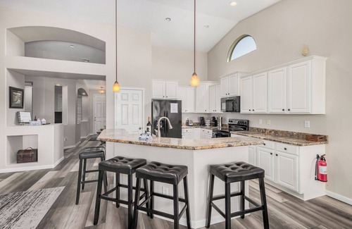 Rovey Farm Estates House | Spa like home, walk to the stadiums, with a private heated pool & newly updated!