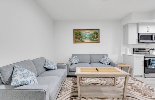 Calgary House | Spacious 2-Bedroom Legal Basement Suite | Private Entrance | 15 Mins to Airport