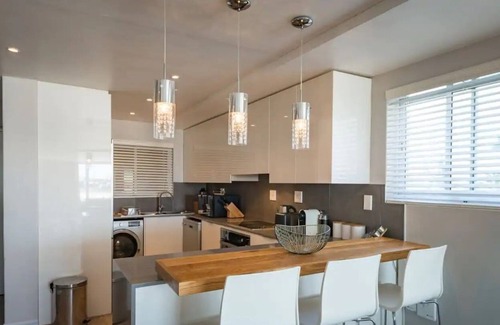 Lagoon Beach Apartment | Spacious 2 Bedroom, Panoramic Sea Views with Wifi and Parking