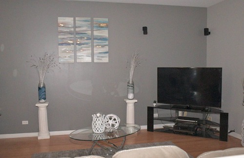 Streamwood House | Spacious 3 bedroom home with King bed/Queen bed. Fun game room and Theater room.