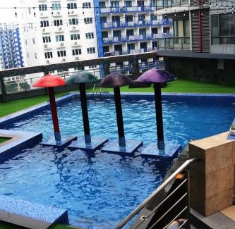 Barangay 76 Apartment | Spacious 3 Bedrooms with wifi access and pool near SM MOA Arena