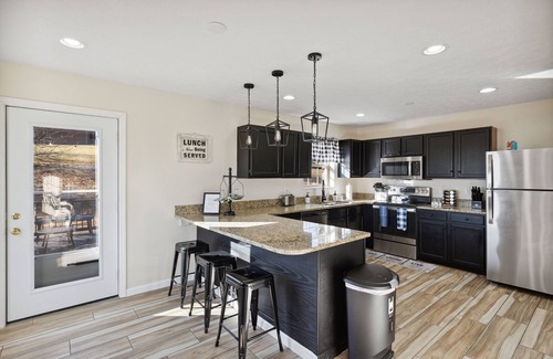 Kodak House | Spacious 4 bd with hot tub, theater &game zone