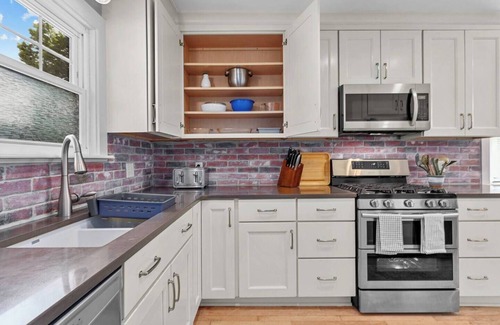 Ward Parkway House | Spacious 4 Bed Home with Backyard Oasis 52