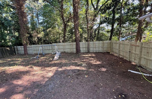 Doraville House | Spacious 4-bedroom 3 bathroom house in lovely Doraville with WiFi, AC, Fenced