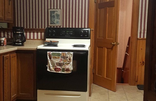 Brighton House | Spacious 4 bedrooms and 1 1/2 bath house. Located near VAST trail and down town.