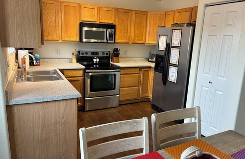 Fountain House | Spacious 4BR/3BA Home for 12,Private Outdoor Movie,Fast Wifi & Equipped Kitchen!