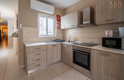 Pieta Apartment | Spacious 4BR,4BATH with AC, Balcony, WIFI & Terrace by 360 Estates