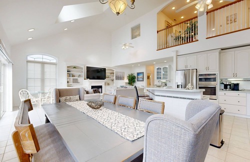 Heron Harbour Isle House | Spacious 5 bedroom, waterfront home w/grill, firepit, full kitchen & shared pool