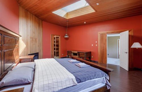 Ladner House | Spacious and bright bedroom with separate bathroom