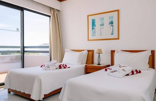 Areias de Sao Joao Hotel | Spacious and Fully-furnished 2BR with Balcony, 2 Outdoor Pools, Near Oura Beach!