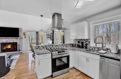 Gouldsboro Ski Chalet | Spacious and Remodeled Cabin in Poconos Mountain Resort. Hot Tub and Game Room!