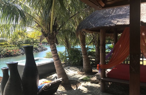 Thio House | Spacious Balinese style house situated right at the water front