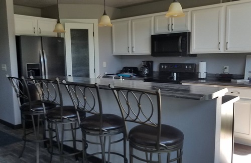 Spirit Lake Cabin | Spacious cabin! Grassy backyard! 3 Brd 2.5 bath Lots of supplies in pantry!