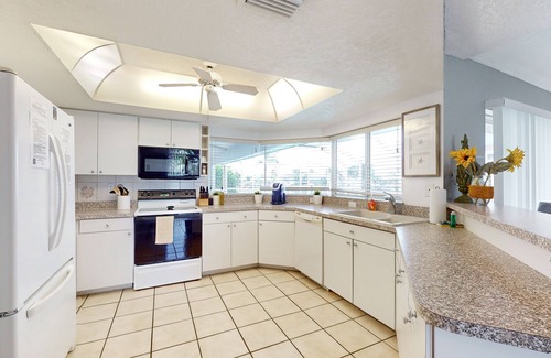 Edgewater House | Spacious Canal-View Home w/Private Pool - 5 Minutes to Sunrise Park