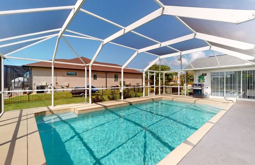 Edgewater House | Spacious Canal-View Home w/Private Pool - 5 Minutes to Sunrise Park