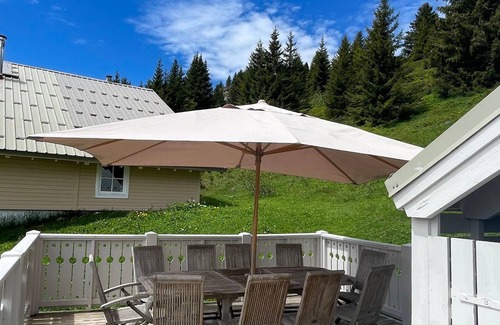 Flaine Ski Chalet | Spacious Chalet · Wood Stove · Free Unlimited WIFI · South-Facing Terrace · Garage · Sleeps 8