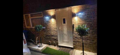 Chessington North and Hook House | Spacious Chessington home with parking & garden