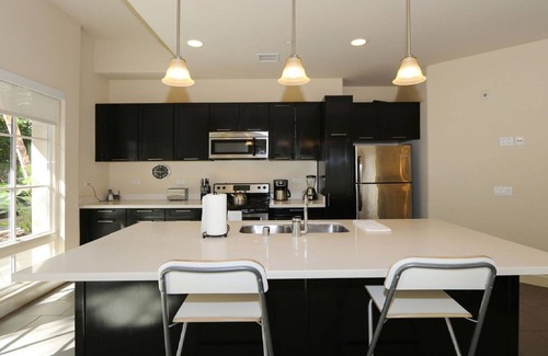 Downtown Apartment | Spacious corner suite with patio +private balcony with direct pool access!