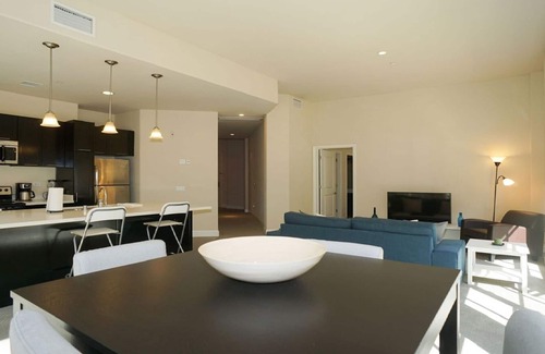 Downtown Apartment | Spacious corner suite with patio +private balcony with direct pool access!