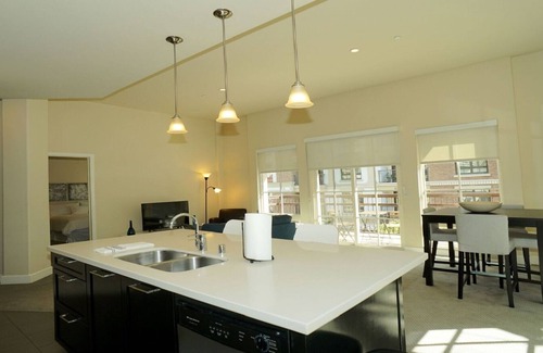Downtown Apartment | Spacious corner suite with patio +private balcony with direct pool access!