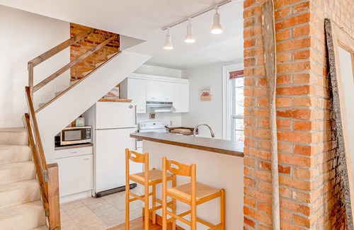 West End Apartment | Spacious downtown apartment with historic charm, natural light, AC & W/D access