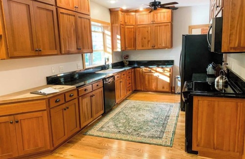 Loudonville House | Spacious, family-friendly lodge on 10 wooded acres. Sleeps 20 with 5 bedrooms, stocked pond