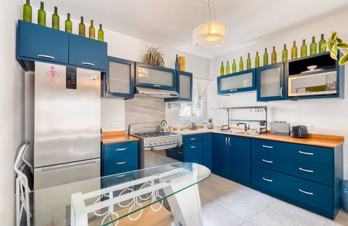 El Centenario House | Spacious home with private pool, garden, and washer/dryer