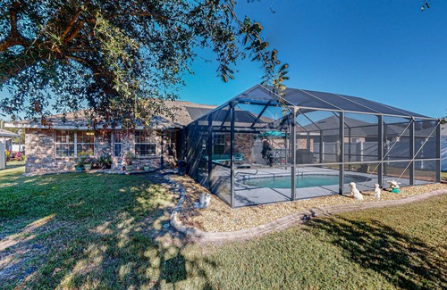 Indian Trails House | Spacious home with saltwater pool, gas grill, patio, & washer/dryer