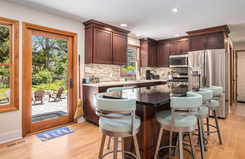 Macatawa House | Spacious house with private pool, badminton, cornhole, firepit, grill, and WiFi