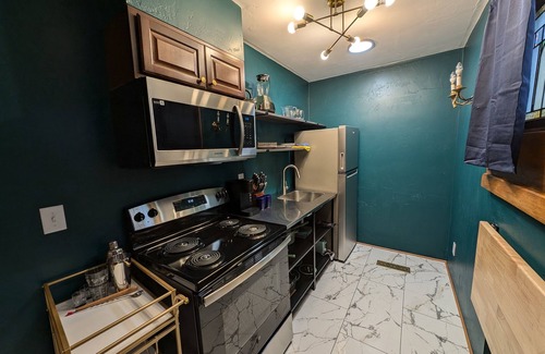 Sturgeon Bay Hotel | Spacious King Suite! Cher inspired unit.