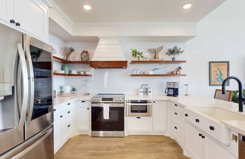 April Sound Condo | Spacious Lake Front Condo, Fish Right Outside the Back Patio