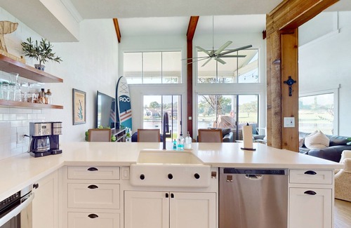April Sound Condo | Spacious Lake Front Condo, Fish Right Outside the Back Patio
