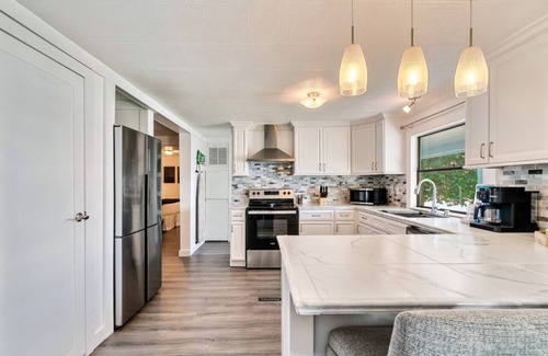 Dandridge House | Spacious Lakefront Home: New Private Boat Dock, Boat Ramp, Hot Tub, Game Room