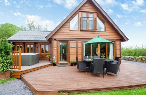 Menai Bridge Ski Chalet | Spacious, light, all wood luxury lodge in tranquil location at head of lake.