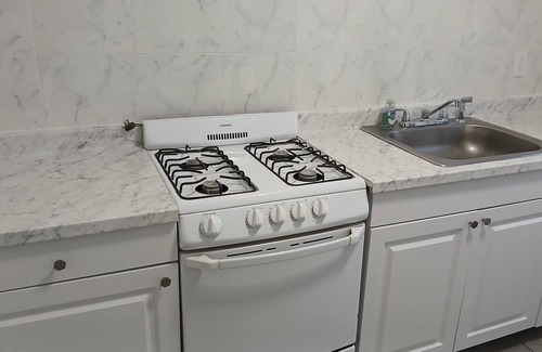 New London House | Spacious master bedroom with a queen and full bed, 2 blocks from Route 95