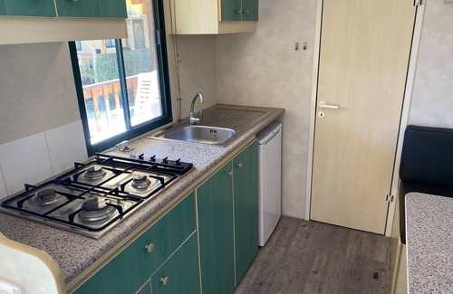 Viareggio Ski Chalet | Spacious mobile home, with veranda, on the family camping Paradiso